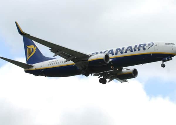 File photo dated 19/05/10 of a Ryanair plane lands at East Midlands Airport in Leicestershire. The budget airline is to slash its 2010/11 winter capacity by 16%. Ryanair will be cutting winter flights at most of its other UK bases, except Edinburgh and Leeds Bradford, and will - overall - fly two million fewer passengers than last winter. PRESS ASSOCIATION Photo. Issue date: Tuesday June 29, 2010. See PA story AIR Ryanair. Photo credit should read: Lewis Stickley/PA Wire ENGEMN00120130521162631